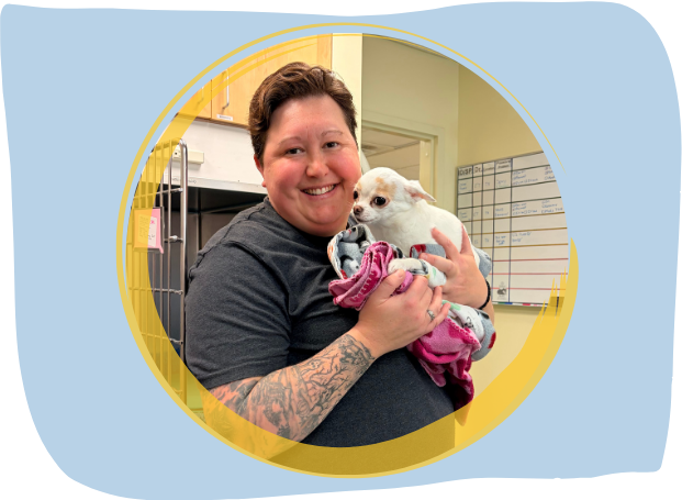 vet staff holding a puppy